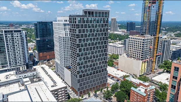 Aerial view of Momentum Midtown within the Atlanta skyline