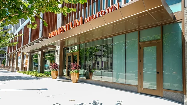 Momentum Midtown signature entrance at 1018 W Peachtree St